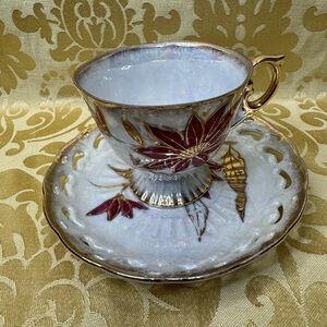 Elegant Gold and Red Floral Teacup and Saucer Set